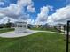Community playground offers a safe and fun environment for with a gazebo, multiple play structures, and grassy areas at 8483 Sw 59Th Ter, Ocala, FL 34476