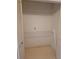 A closet with shelving and storage, and flooring, offering ample storage solutions at 9012 Sw 91St Cir, Ocala, FL 34481