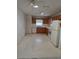 Functional kitchen layout featuring light oak cabinetry, appliances, and plenty of space at 9012 Sw 91St Cir, Ocala, FL 34481
