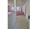 Open-concept living space with neutral walls, and transition to the other rooms at 9012 Sw 91St Cir, Ocala, FL 34481