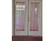 Double French Doors leading to the outside, with access to an outdoor area at 9012 Sw 91St Cir, Ocala, FL 34481