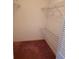 Functional walk in closet with installed shelving and storage at 9012 Sw 91St Cir, Ocala, FL 34481