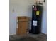 Image features the water heater in the basement or utility room at 9012 Sw 91St Cir, Ocala, FL 34481