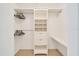 Well-organized closet with shelves, drawers, and ample hanging space at 9058 Sw 108Th Pl, Ocala, FL 34481