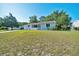 Charming single-story home with well-maintained lawn and welcoming front porch at 9058 Sw 108Th Pl, Ocala, FL 34481
