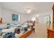 Bright main bedroom featuring two beds, large windows, and ample closet space at 9058 Sw 108Th Pl, Ocala, FL 34481