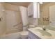 Clean, well-maintained bathroom with a shower-tub combo, vanity, and ample storage at 9088 Sw 95Th Ave, Ocala, FL 34481