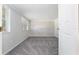 Cozy bedroom with carpeting, a window, and closet at 9900 Ne 20 Terrace Rd, Anthony, FL 32617