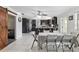 Open-concept dining area providing seamless access to the kitchen, ideal for gatherings and entertaining at 9900 Ne 20 Terrace Rd, Anthony, FL 32617