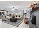 Cozy living room features fireplace, comfortable seating, and stylish decor; perfect for relaxation and entertaining at 9900 Ne 20 Terrace Rd, Anthony, FL 32617