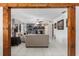 Bright living room with a cozy fireplace and neutral decor, creating a relaxing atmosphere at 9900 Ne 20 Terrace Rd, Anthony, FL 32617
