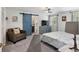 Main bedroom with a barn door and accent furniture at 9900 Ne 20 Terrace Rd, Anthony, FL 32617