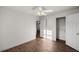 Bright bedroom showcasing wood-look flooring, closet, and fresh neutral paint at 1309 Ne 33Rd St, Ocala, FL 34479