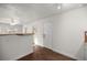 Spacious living area featuring new wood-look floors and fresh paint at 1309 Ne 33Rd St, Ocala, FL 34479