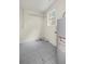 The utility room features tile floors, a window, and a water heater at 1309 Ne 33Rd St, Ocala, FL 34479