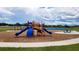 Community playground for , featuring slides, climbing structures, picnic tables and recreation for Gathering fun at 15814 Se 101St Cir, Summerfield, FL 34491