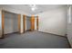 Spacious bedroom with ceiling fan, closet, and doorway to hallway at 164 Ne 53Rd St, Ocala, FL 34479