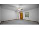 Bedroom with carpet flooring, a ceiling fan, and a window for natural light at 164 Ne 53Rd St, Ocala, FL 34479