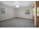 Cozy bedroom with natural light, ceiling fan, and closet at 164 Ne 53Rd St, Ocala, FL 34479