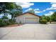 Detached two car garage with new landscaping and a side entry door at 164 Ne 53Rd St, Ocala, FL 34479