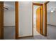 Hallway view with doorways to two bedrooms and a full bathroom at 164 Ne 53Rd St, Ocala, FL 34479