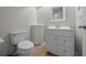 Cozy bathroom with white vanity and toilet at 2343 Se 19Th Cir, Ocala, FL 34471