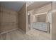 Hallway view to the bathroom with vanity and closet at 2343 Se 19Th Cir, Ocala, FL 34471