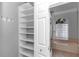 Bathroom with built-in shelves and luxurious tub at 2369 Nw 53Rd Avenue Road, Ocala, FL 34482