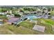 Aerial view of the community clubhouse, tennis courts, swimming pool and shuffleboard courts at 2369 Nw 53Rd Avenue Road, Ocala, FL 34482