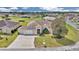 Inviting single-story home with a well-manicured lawn and a two-car garage in a serene neighborhood at 2369 Nw 53Rd Avenue Road, Ocala, FL 34482