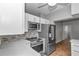 Updated kitchen featuring stainless steel appliances and tiled backsplash at 2369 Nw 53Rd Avenue Road, Ocala, FL 34482