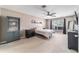 Primary bedroom featuring neutral tones, a ceiling fan, and two dressers at 2689 Sw 165Th Street Rd, Ocala, FL 34473