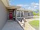 Close up of home's front door, landscaping, and walkway up to the home at 2689 Sw 165Th Street Rd, Ocala, FL 34473