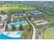 Aerial view highlighting community amenities including tennis courts, pool, and manicured grounds at 3918 Nw 46Th Ter, Ocala, FL 34482