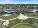 Stunning aerial shot of the community center, boasting a lush landscape, and water features at 3918 Nw 46Th Ter, Ocala, FL 34482