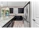 Close-up of the kitchen featuring stainless steel appliances and a view of the backyard at 3918 Nw 46Th Ter, Ocala, FL 34482