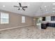 An open-concept living room connects to the kitchen, offering a seamless flow at 3918 Nw 46Th Ter, Ocala, FL 34482