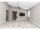 A spacious living room with high ceilings has abundant natural light and modern flooring at 3918 Nw 46Th Ter, Ocala, FL 34482