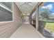 The extended screened patio overlooks the backyard and offers a relaxing outdoor living space at 3918 Nw 46Th Ter, Ocala, FL 34482