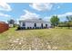 Spacious backyard showcasing a well-maintained lawn and tasteful landscaping, perfect for outdoor enjoyment and activities at 4085 Sw 110Th St, Ocala, FL 34476