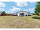 Expansive backyard featuring a patio with picnic table and ample sunshine at 4085 Sw 110Th St, Ocala, FL 34476