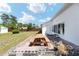 Backyard patio featuring a picnic table on a brick patio and a sunny view at 4085 Sw 110Th St, Ocala, FL 34476