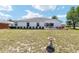 Expansive backyard featuring a well-maintained lawn, patio, and tasteful landscaping, perfect for outdoor entertaining at 4085 Sw 110Th St, Ocala, FL 34476