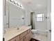 Bathroom features a tiled floor, a single vanity, and a shower-tub combo at 4085 Sw 110Th St, Ocala, FL 34476