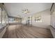 Spacious Florida room featuring lots of windows and ceiling fans at 4401 Sw 44Th Ln, Ocala, FL 34474