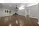 Spacious living room featuring hardwood floors, recessed lights, and a cozy fireplace at 4401 Sw 44Th Ln, Ocala, FL 34474