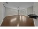 Spacious living room featuring hardwood floors, recessed lights, and lots of natural light at 4401 Sw 44Th Ln, Ocala, FL 34474