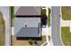 This aerial view shows the home's roof and proximity to neighbors at 4763 Se 25Th Loop, Ocala, FL 34480
