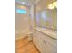 Bathroom offers bathtub and shower combo, tile backsplash, and modern vanity at 4763 Se 25Th Loop, Ocala, FL 34480
