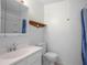 Bathroom featuring a tub/shower combination, toilet and sink/vanity with overhead lighting at 4810 County Road 114, Wildwood, FL 34785